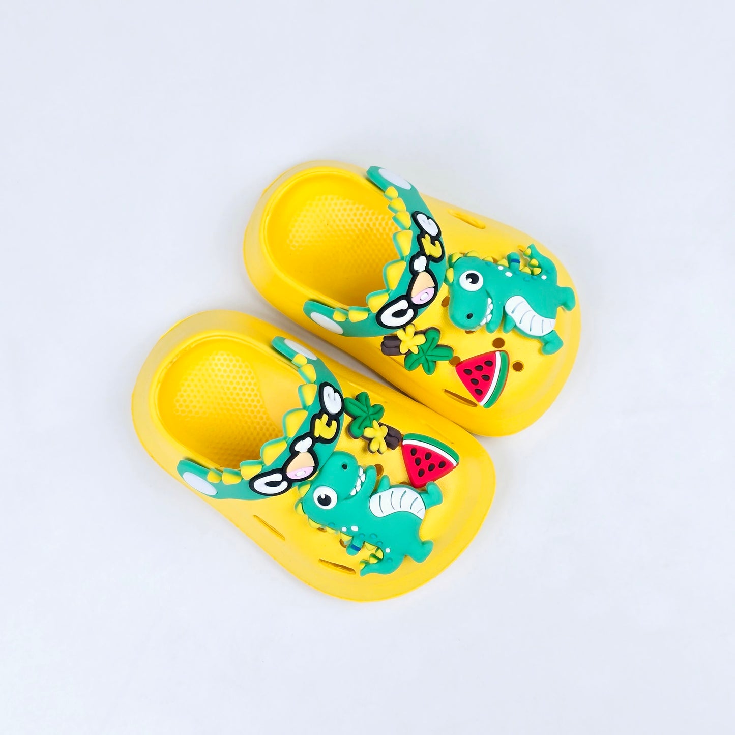 Parrot ,White, Pink,Yellow and Blue crocs with dinosaur pattern