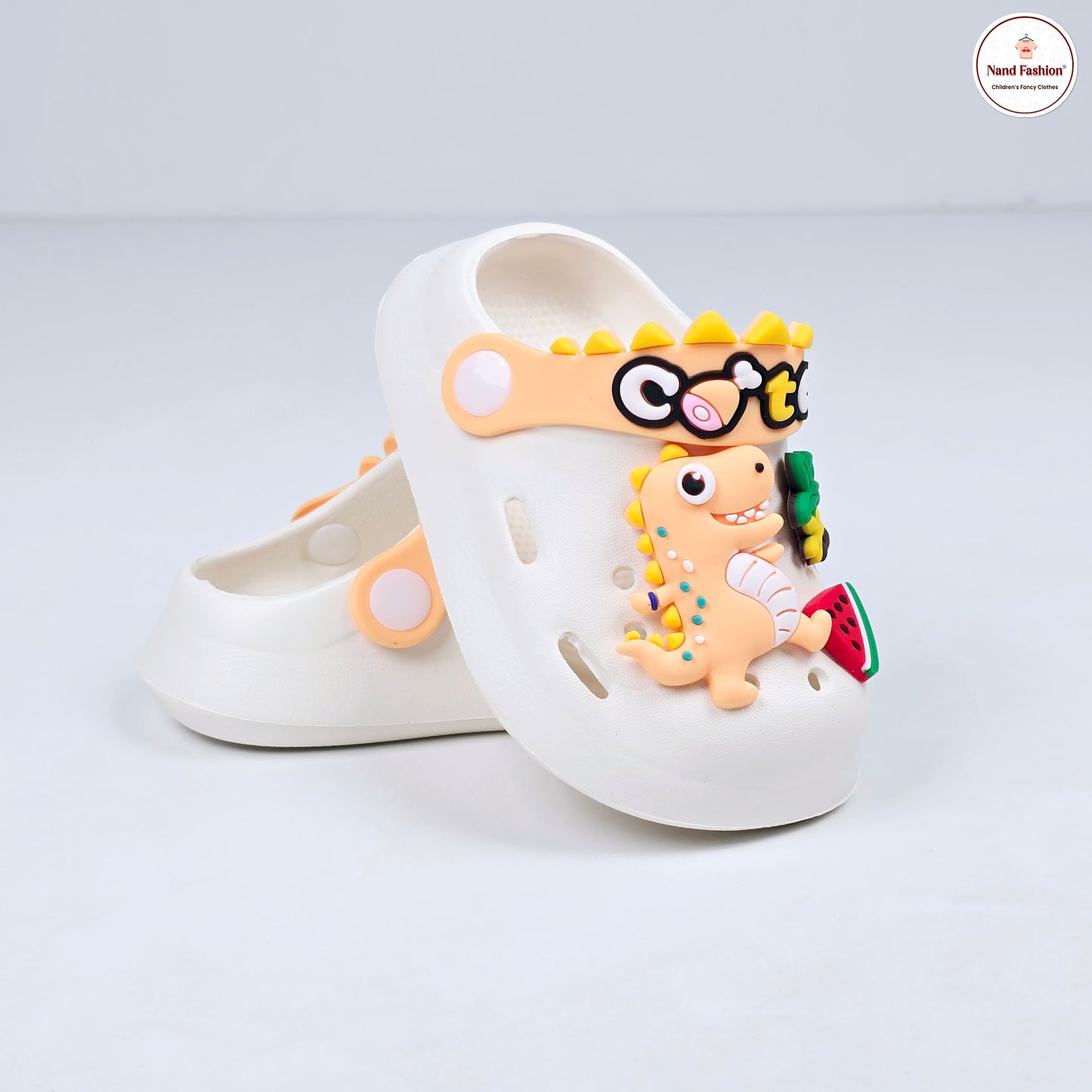 Parrot ,White, Pink,Yellow and Blue crocs with dinosaur pattern