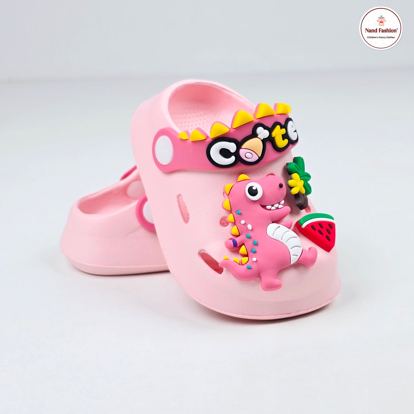 Parrot ,White, Pink,Yellow and Blue crocs with dinosaur pattern