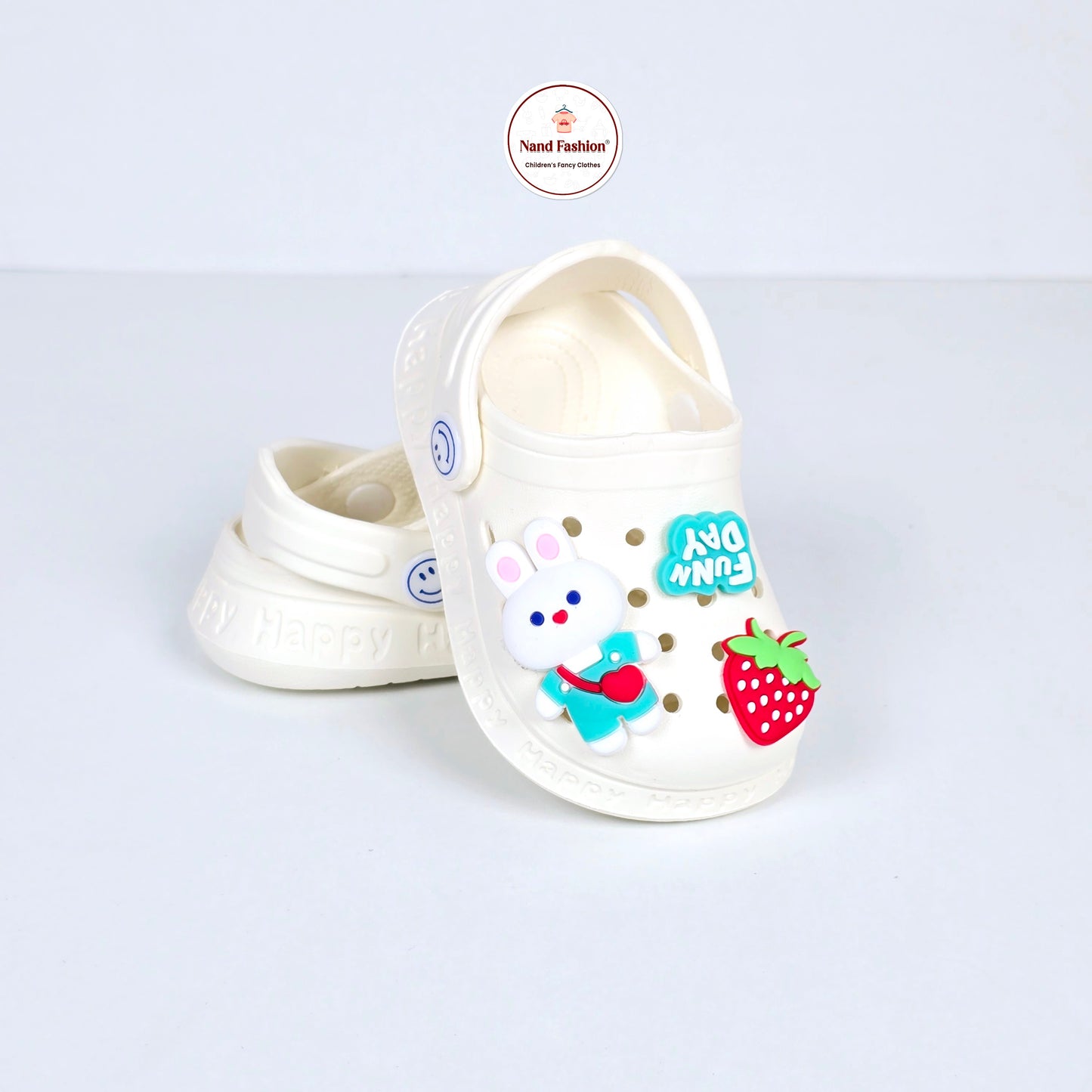 White and pink crocs with Cartoon ans Strawberry pattern