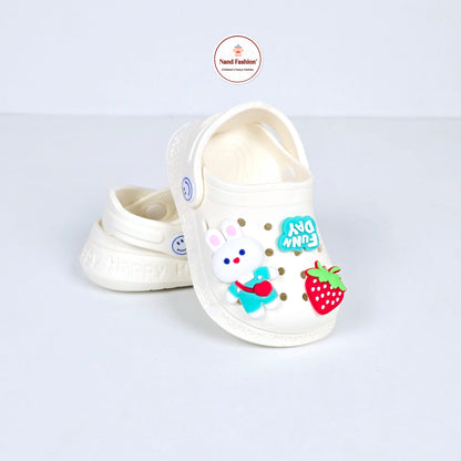 White and pink crocs with Cartoon ans Strawberry pattern