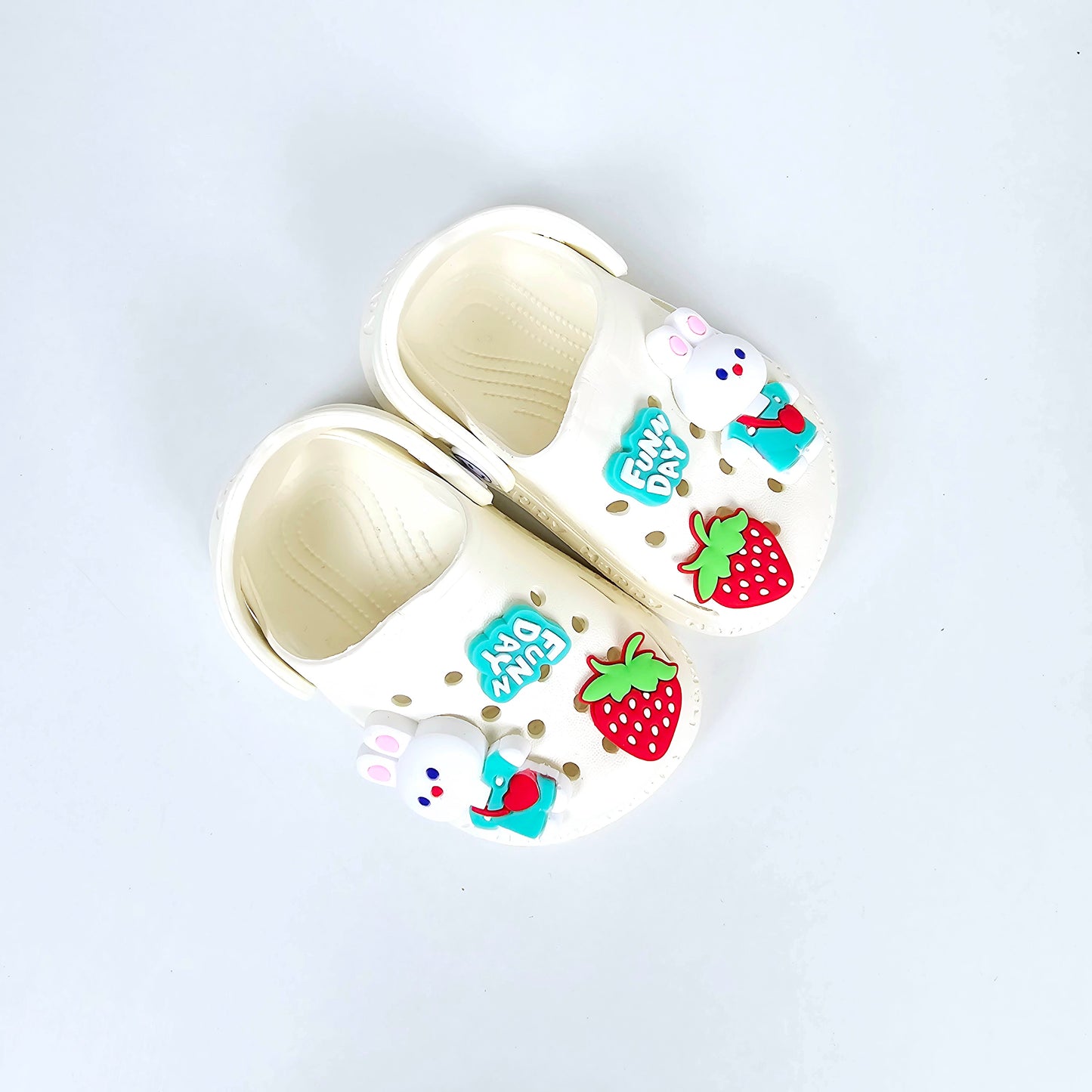 White and pink crocs with Cartoon ans Strawberry pattern