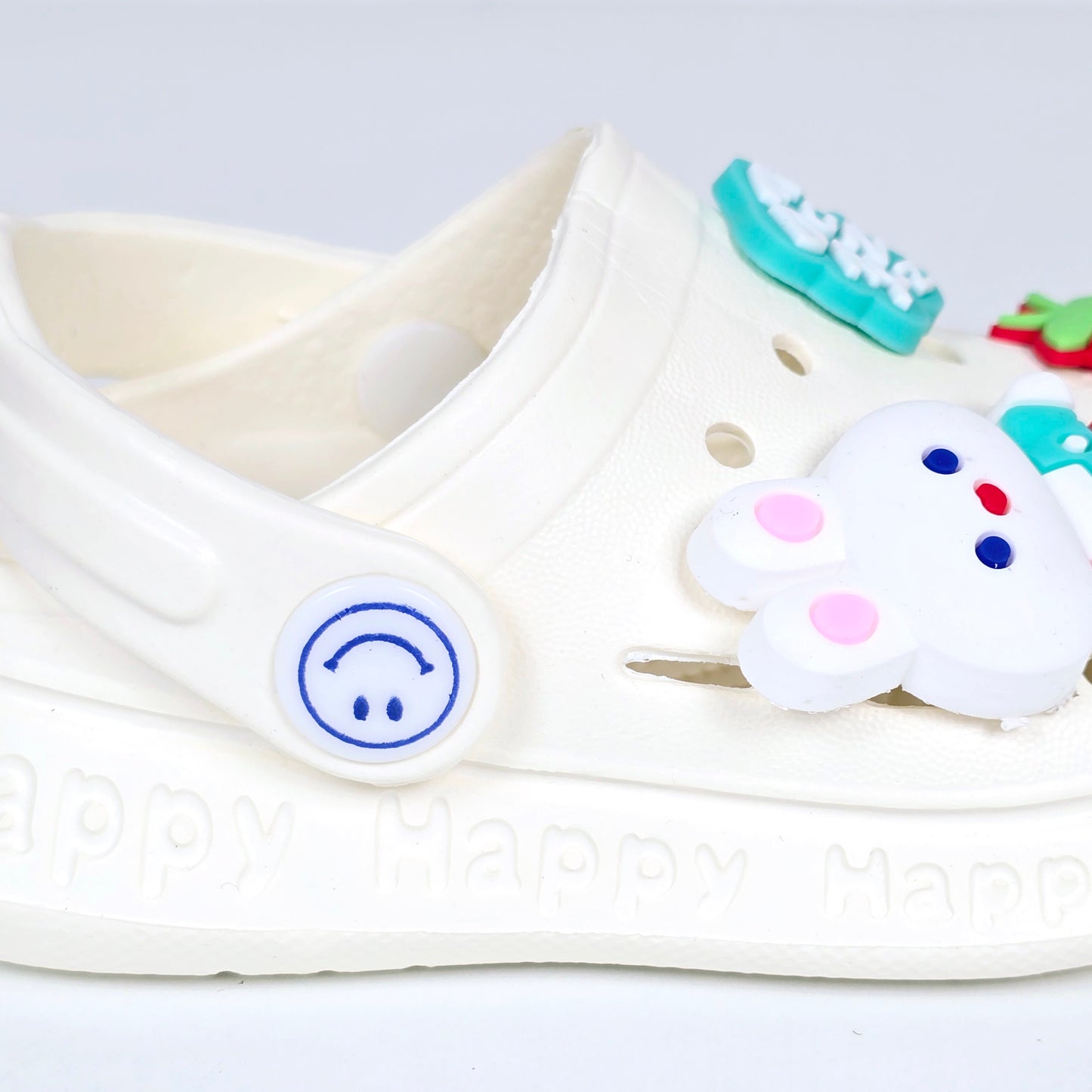 White and pink crocs with Cartoon ans Strawberry pattern