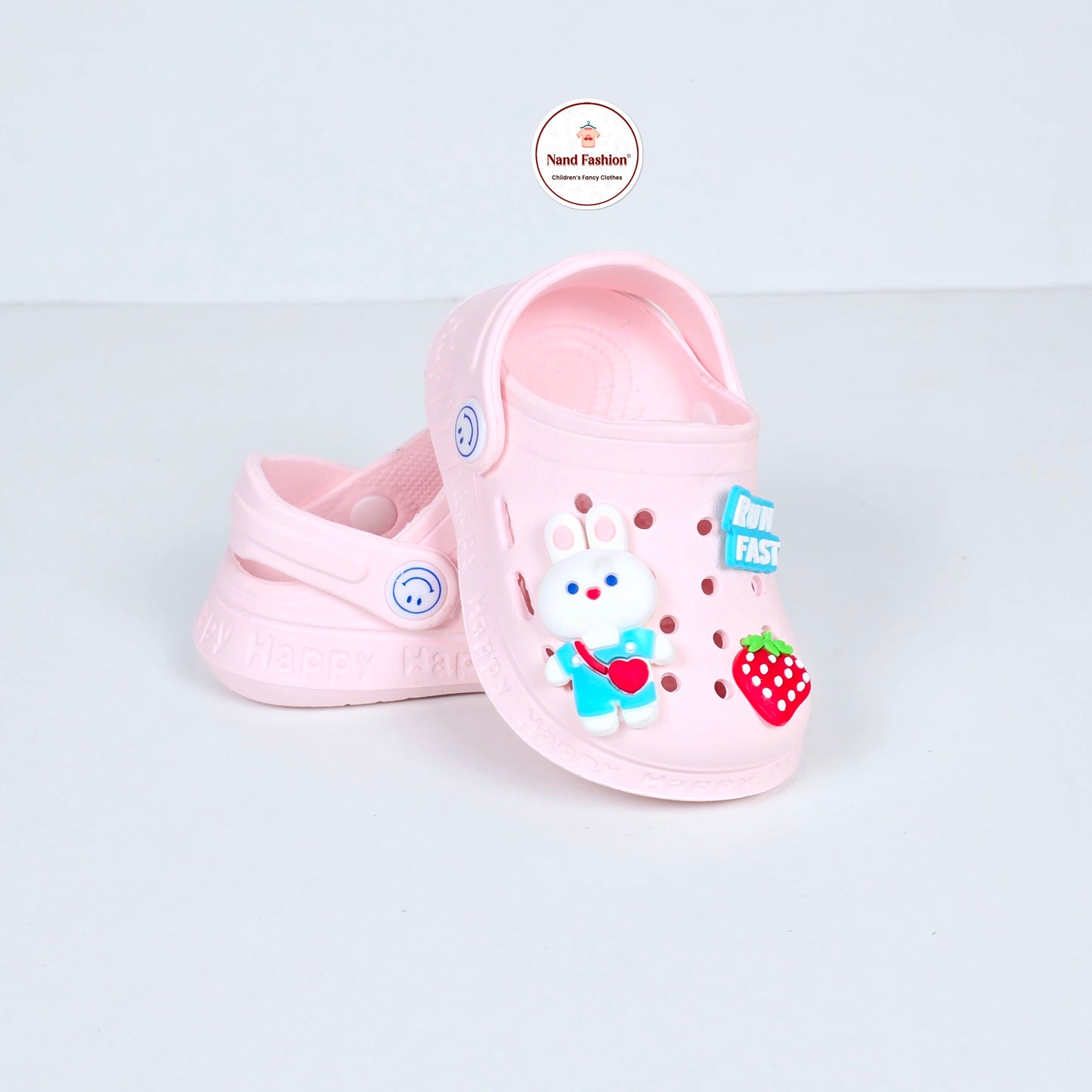 White and pink crocs with Cartoon ans Strawberry pattern