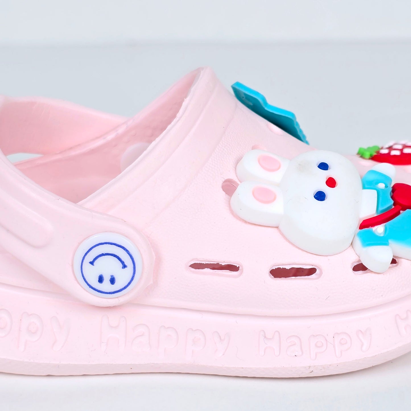 White and pink crocs with Cartoon ans Strawberry pattern